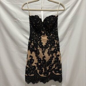 Beautiful nude and black Sherri Hill for prom or any dress up event